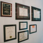 Diplomas on a wall in the dental office
