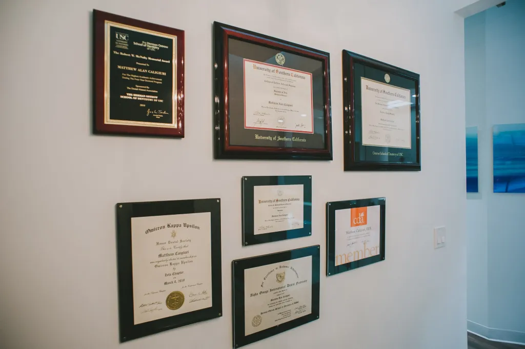 Diplomas on a wall in the dental office