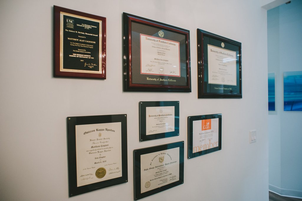 Diplomas on a wall in the dental office